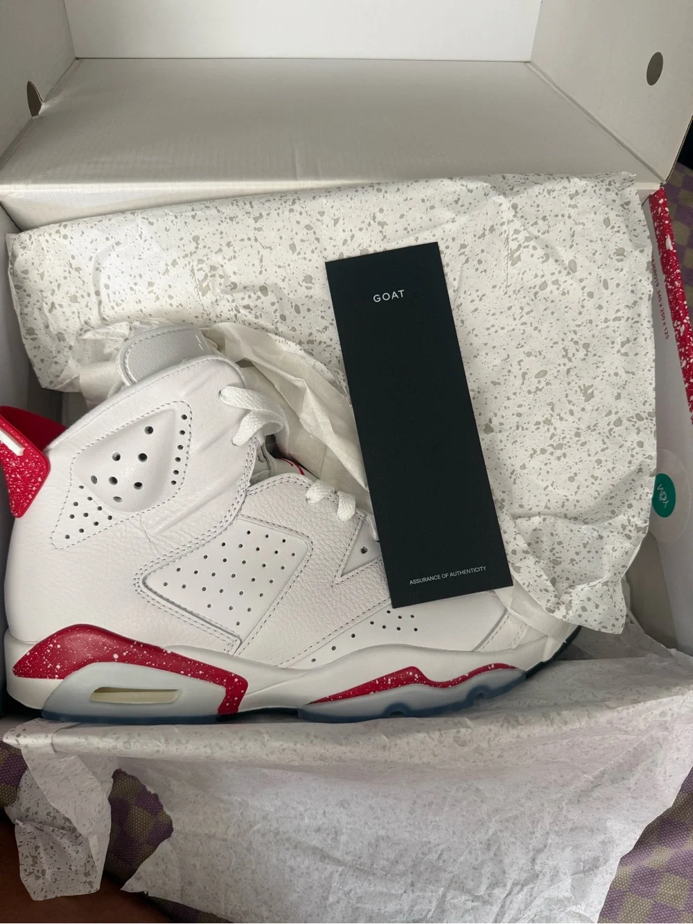 Jordan White and Red Retro Sneakers
